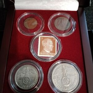 Adolf Hitler: A collection of four coins and one stamp. 2 & 5 Silver Reichsmark